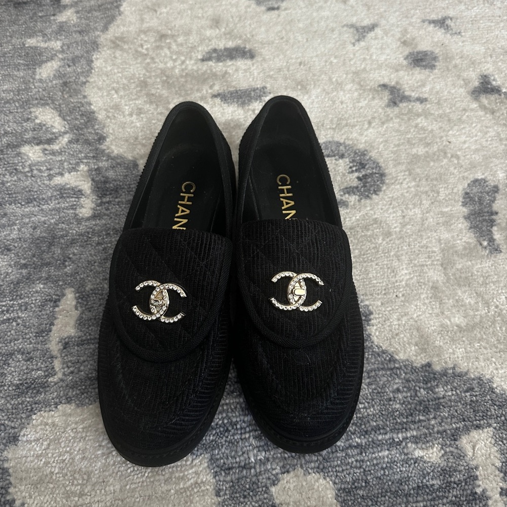 CHANEL Black Loafers with Silver Accents